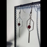 Boucles d'oreilles "Évolution" en grenat