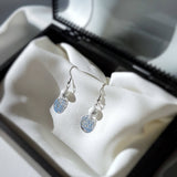 Boucles d'oreilles "La croisée des chemins" en Howlite