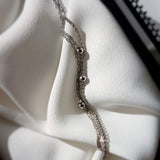 Bracelet "Mouvement" 3 rangs perles en acier inoxydable